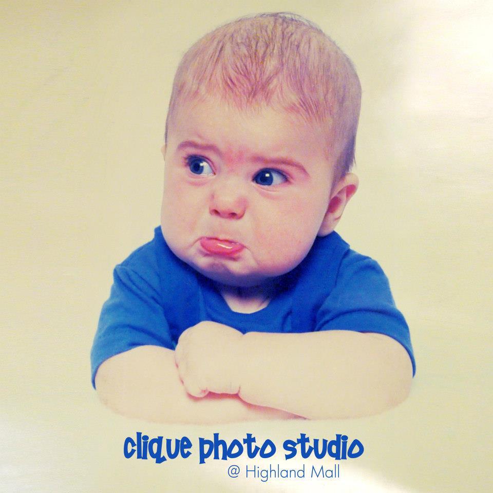 Clique Photo Studio at Highland Mall original photo of the pouting boy in a blue shirt, with arms crossed.